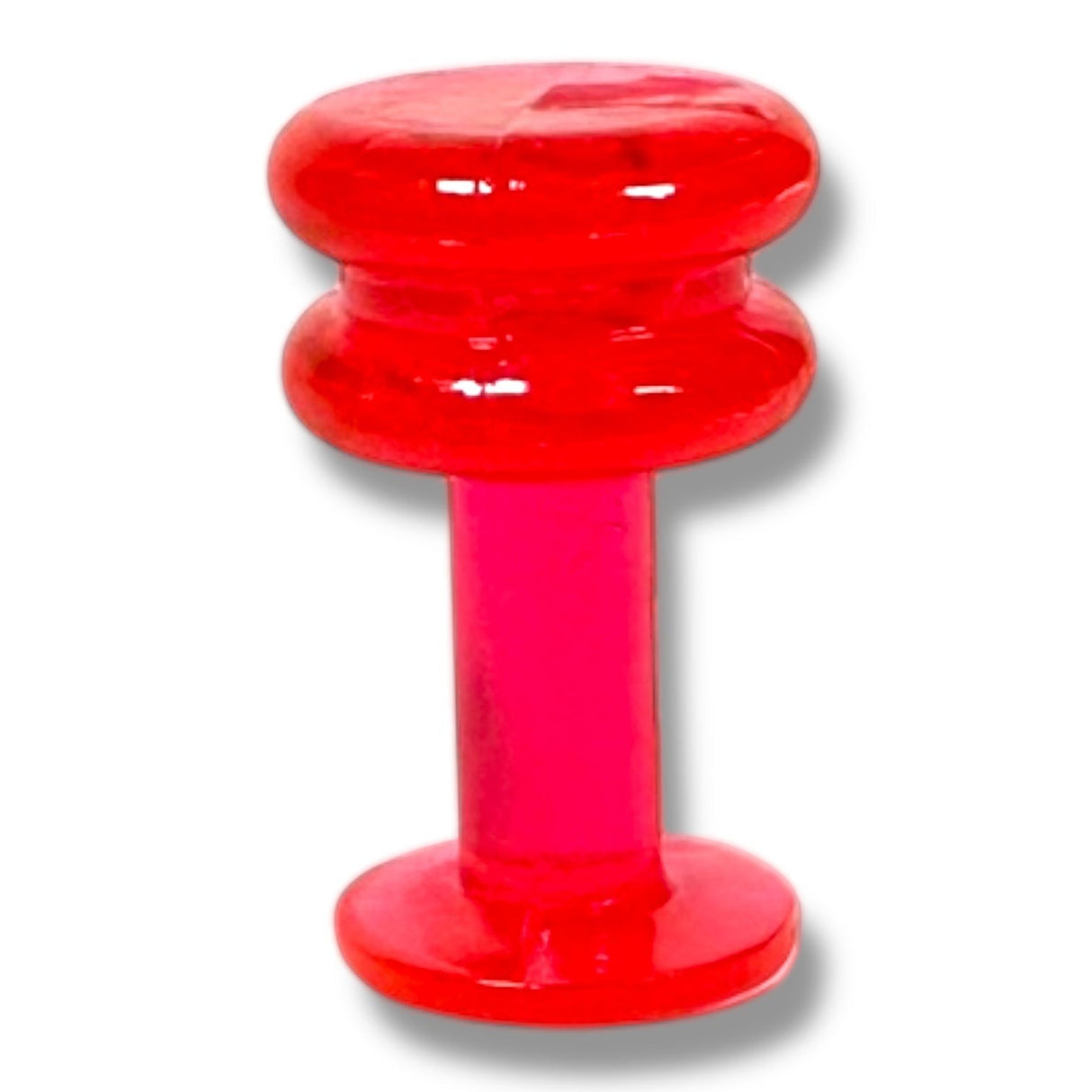 Anson PDR red plastic dent pulling tab with a double-ridged head and flat base.