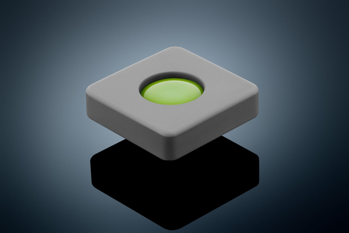 Anson PDR Glexo Diablo Cold Glue in a grey silicone mold with a bright green glue center, designed for paintless dent repair.