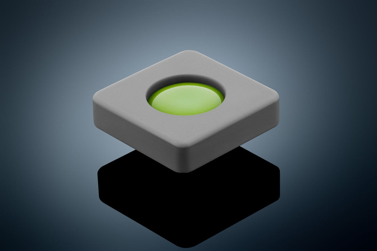 Anson PDR Glexo Diablo Cold Glue in a grey silicone mold with a bright green glue center. Professional PDR tool.