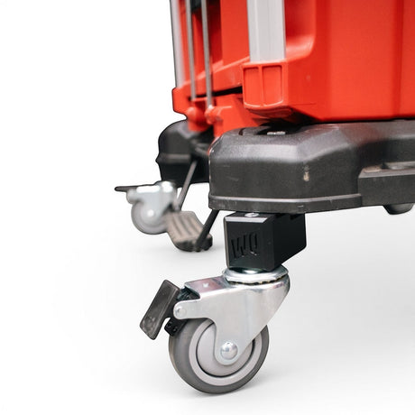 Anson PDR WQ Packout Glideator Caster Upgrade Kit with black mounting blocks and silver casters on a red tool box.