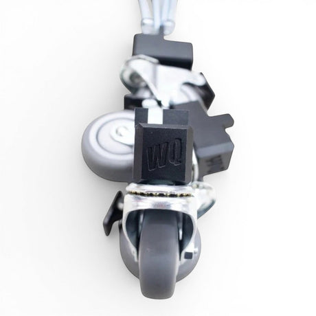 Willey Quick Packout Glideator Caster Upgrade Kit with black mounting blocks and grey wheels.