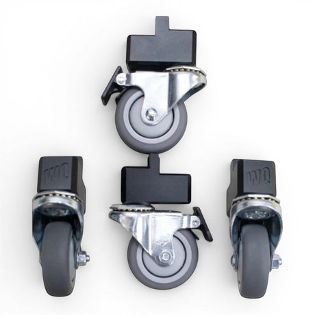 WQ Packout Glideator Caster Upgrade Kit with four grey rubber casters and black mounting blocks for improved stability and mobility.
