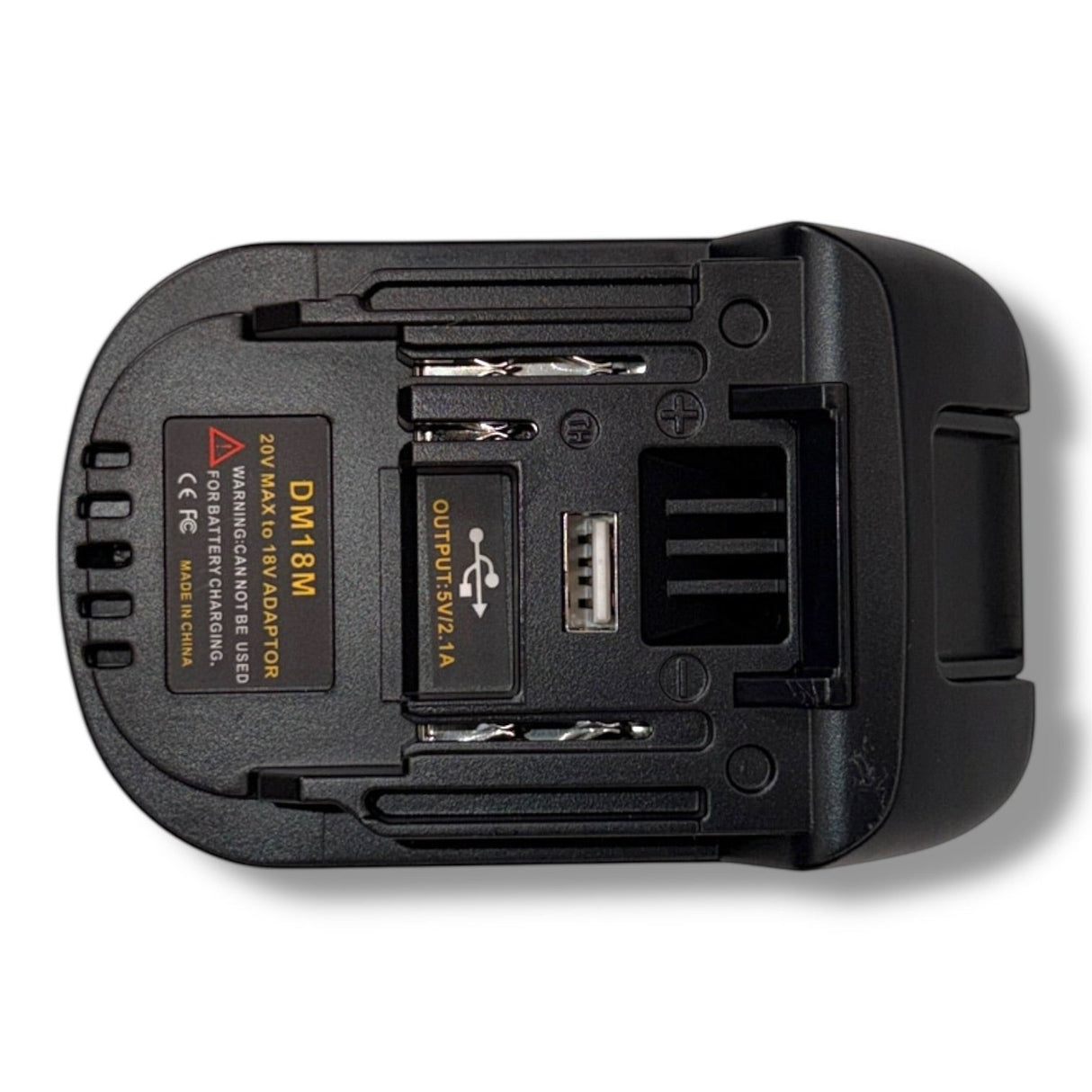 Anson PDR black plastic 20V MAX to 18V tool battery adapter with USB output for mobile devices. Adapts Makita to either Milwaukee or Dewalt