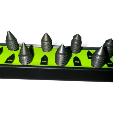 Anson PDR Black Plague micro tips set with various metal precision tips arranged on a magnetic green organizer stand.