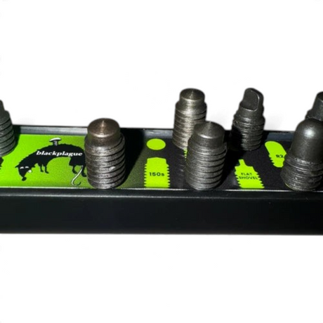 Anson PDR Black Plague micro tips set with various metal tip profiles arranged on a magnetic organizer stand