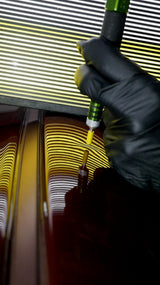 Anson PDR Tequila Galaxy aluminum tip with yellow soft cap on a dented car panel.