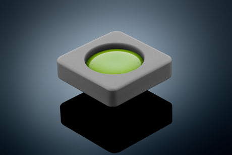 Anson PDR Glexo Diablo Cold Glue in a grey silicone mold with a bright green center, designed for paintless dent repair.