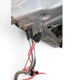 Anson PDR clamp-style rope ratchet with red cord attached to a car hood stand for dent repair.