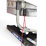 Anson PDR clamp style rope ratchet with red cord attached to a metal hood stand arm.