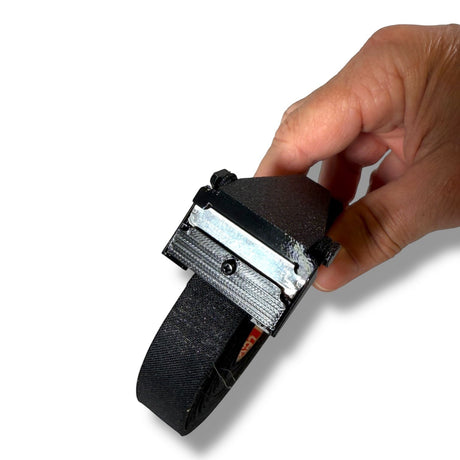 Anson PDR Tape Sniper cutter with a sharp blade for precise tape cutting, held by a hand.